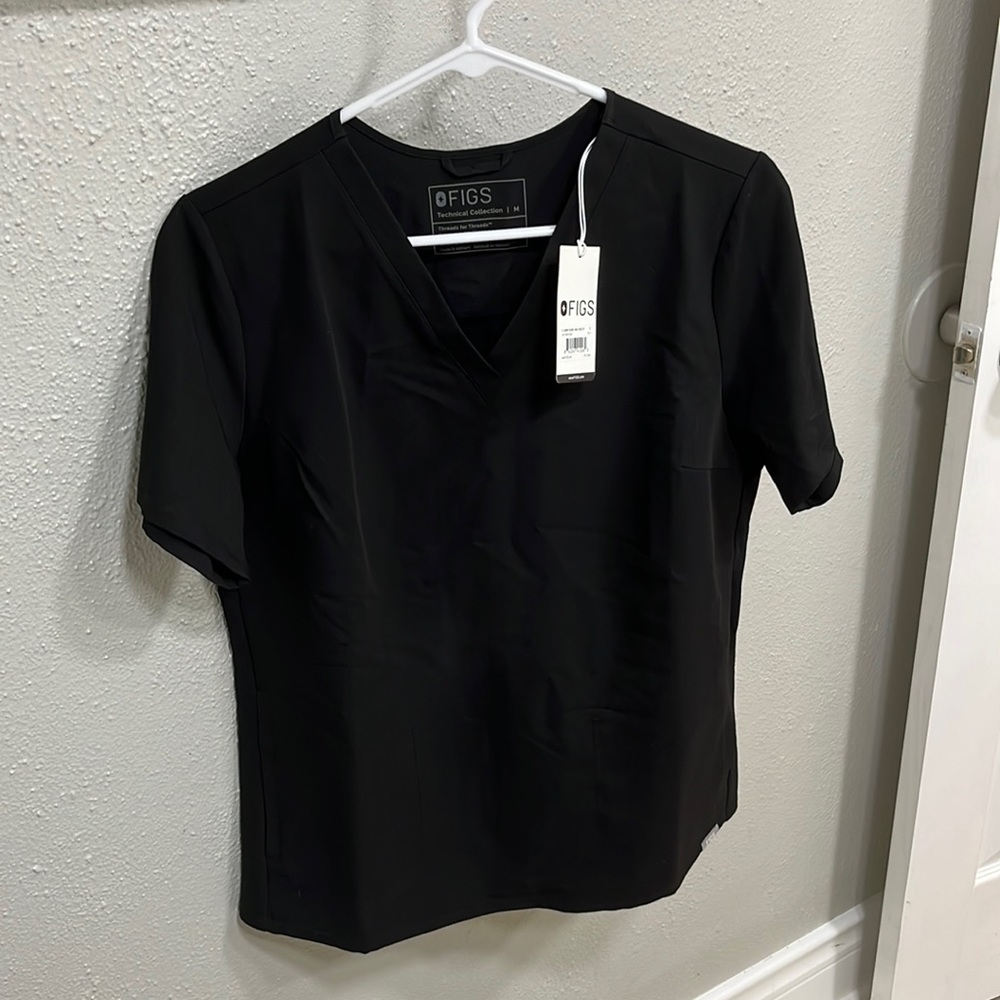 FIGS Black scrub top. Size medium
